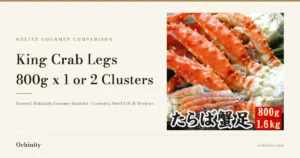 Feature image for Gensen! Hokkaido Gourmet Kanisho King Crab Legs 800g x 1 or 2 Clusters, showing boiled red king crab legs in the shell laid out on a black tray lined with crushed ice and spring onions