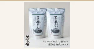 灰色の背景に、緑の帯と筆文字の「茅乃舎だし 焼きあご入」と書かれた銀色のスタンドパウチ入りだしパック（30袋入）が2袋並んだ商品写真。店舗が画像に入れた表示「だしパック30袋：2個セット」「茅乃舎公式ショップ」。袋の表示「創業明治二十六年」「久原本家 謹製」「国産原料使用」「焼きあご、かつお節、うるめいわし、真昆布」