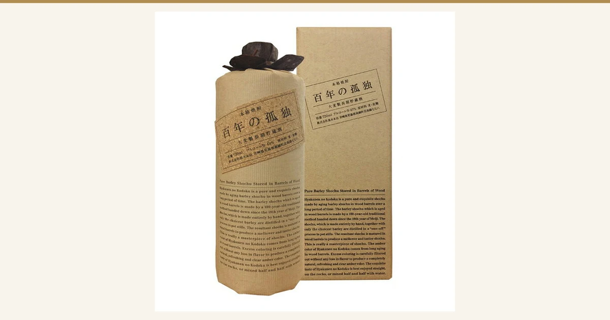 Featured image for Kuroki Honten Hyakunen no Kodoku Barley Shochu 40% 720ml. A product photo of a bottle wrapped in brown paper standing next to an upright brown box. The labels on the bottle and box read “本格焼酎” (authentic shochu), “百年の孤独” (Hyakunen no Kodoku) and “大麦製長期貯蔵酒” (long-aged barley spirit), and an English product description is also printed