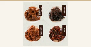 Product photo of four kinds of tsukudani, each on a round plate, in two rows of two. The labels the shop placed in the image read, top row: “ふっくらあさり旨煮” and “あさり昆布”; bottom row: “かつお生姜煮” and “鮪昆布.” Yaizu Specialty Tsukudani, Choose 2 or 3 Items
