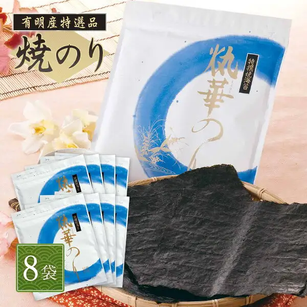 安芸郷 有明产 烤海苔 まるはなのり 8袋装 80片的商品图片。照片中有一个印有蓝色圆圈图案的白色大袋子、八个同样图案的小袋子(两排各四个),以及放在竹筐上的全型烤海苔,背景有白色花朵和樱花花瓣。袋子上印有「特撰焼海苔」,以及由「火」与「丸」组合成的字加上「華のり」构成的商品名(注音「まるはな」)。店铺在图片中加入的标示:「有明産特選品」「焼のり」(左上)、「8袋」(左下)
