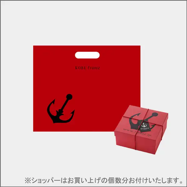 Photo of the packaging of Kobe Franz Kobe Mahou no Tsubo Pudding, 4 Pieces: a red hand-carry bag (shopper) next to a red gift box with a black anchor mark and a black tag. The bag reads "KOBE Frantz" and the box reads "www.frantz.jp". Text the shop placed in the image: "※ショッパーはお買い上げの個数分お付けいたします。".