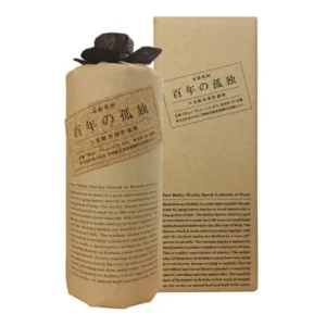 Photo of Kuroki Honten Hyakunen no Kodoku Barley Shochu 40% 720ml. A bottle wrapped in brown paper stands next to an upright brown box. The labels on the bottle and box read “本格焼酎” (authentic shochu), “百年の孤独” (Hyakunen no Kodoku) and “大麦製長期貯蔵酒” (long-aged barley spirit), and an English product description is also printed